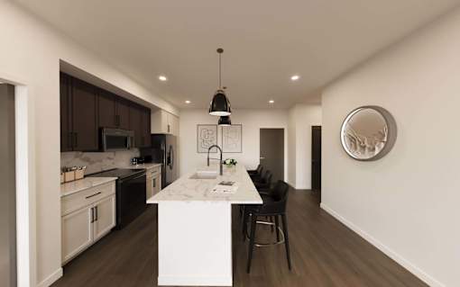 Modern Kitchen with white island at The Union Flats at Fishers District, Fishers, IN