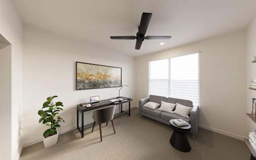 Room with desk and couch at The Union Flats at Fishers District, Indiana, 46037