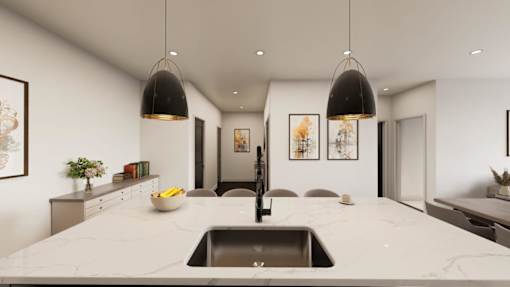 A modern kitchen with a marble countertop and pendant lights.