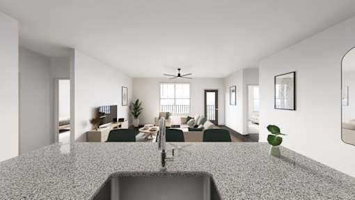 A modern kitchen with a granite countertop and a sink at The Logan Luxury Apartments, Idaho, 83651