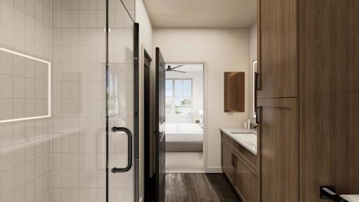 A modern bathroom with a walk-in shower and a toilet.