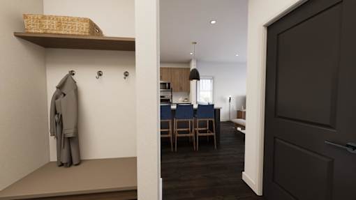 A room with a dining table and chairs is visible through an open door.