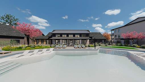 A modern building with a pool in front and trees with pink flowers on the left.