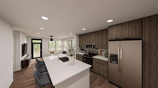 A modern kitchen with a white island and wooden cabinets.