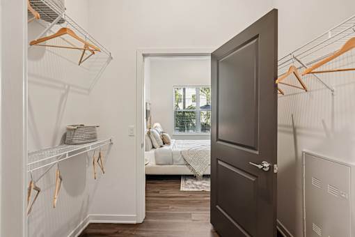A room with a brown door and a white wall at The Stadler Luxury Apartments, Florida