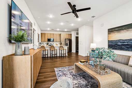 Open living and dining space with wood flooring at Velara Luxury Apartments, Ponte Vedra Beach
