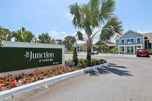 The Junction at Rockledge sign in front of a building.