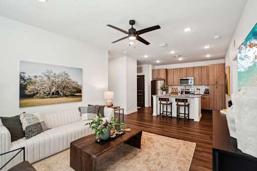 Living Area With Kitchen View at The Pullman Luxury Apartments, Georgia, 30349