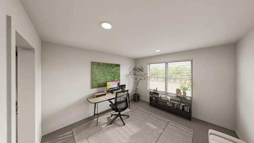 A room with a desk and a chair.