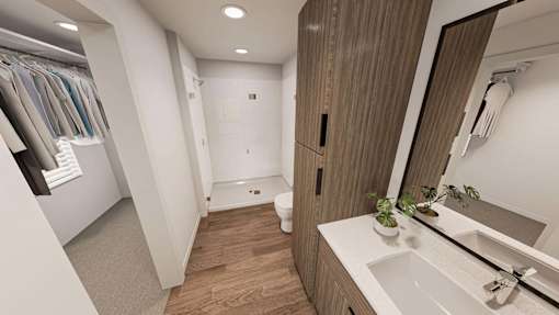 A bathroom with a white sink and a mirror.