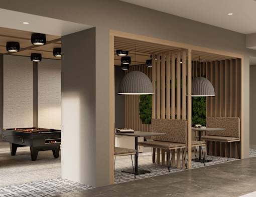 A room with a pool table and a dining area.