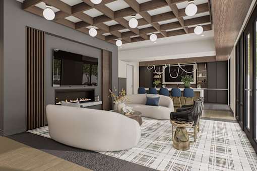 A modern living room with a fireplace and a large sofa.