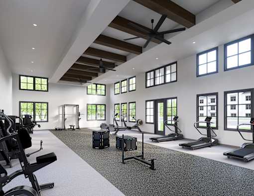 A spacious gym with a variety of equipment at Terrassa Luxury Apartments, Florida