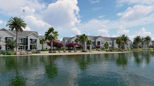 a large body of water with some houses and palm trees at The Junction at Rockledge Apartments, Florida, 32955