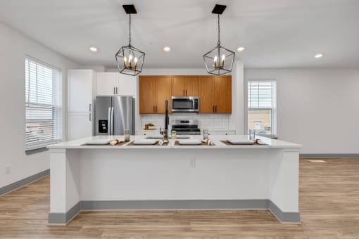 a kitchen with a large counter top and a sink at Meridian at CityPlace, Minnesota, 55125
