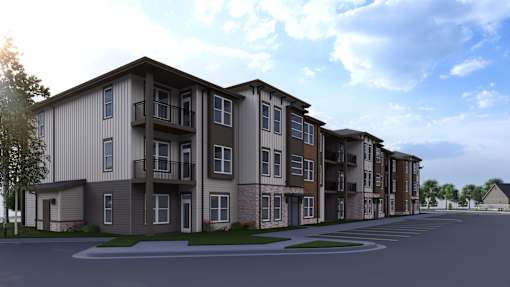 A row of modern apartment buildings are shown in this image at The Logan Luxury Apartments, Idaho