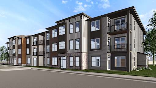 A modern apartment building with balconies and multiple windows. at The Logan Luxury Apartments, Nampa, Idaho
