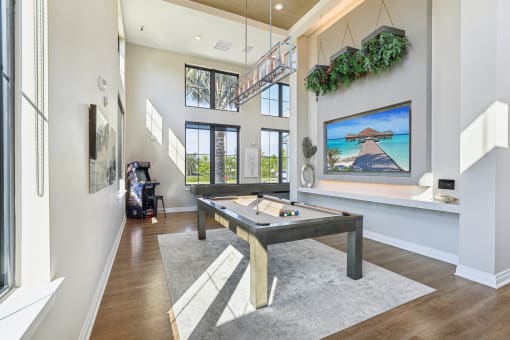 a billiards table in a living room with a view of the pool table at Drift, Daytona Beach, FL, 32117