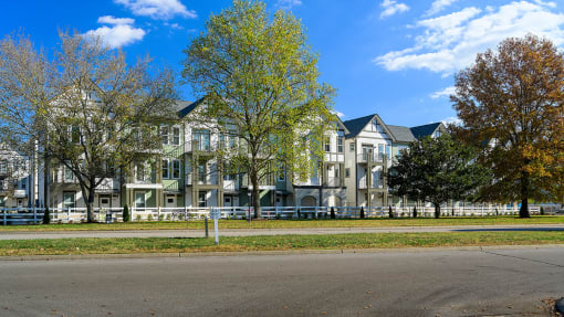 a row of houses on the side of a street  at Oakbrook Townhomes, Franklin, 37067