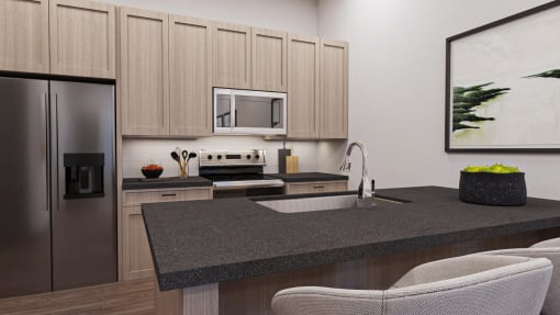 a kitchen with a granite counter top and a stainless steel refrigerator  at Alta25, Monument