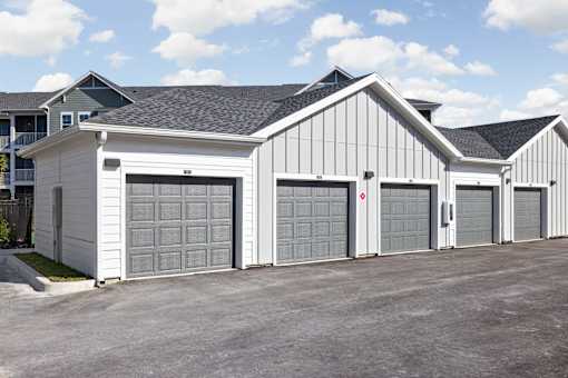 A row of garage doors are closed.