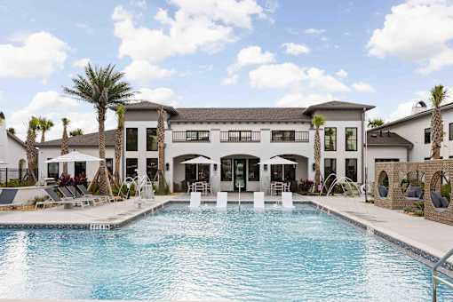 Pool With Relaxing Chairs at Terrassa Luxury Apartments, St. Augustine