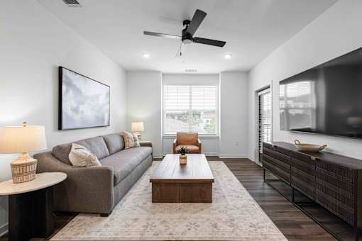 Living Room With TV at Terrassa Luxury Apartments, Florida