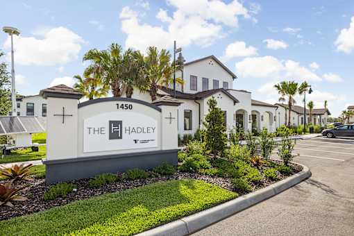 The Hadley apartments are located at 1450 and feature a modern design.