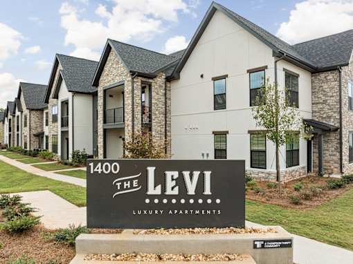 Welcoming Property Signage at The Levi Luxury Apartments, McDonough