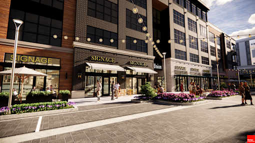 A street view of a building with the name at The Union Flats at Fishers District, Fishers, IN 46037