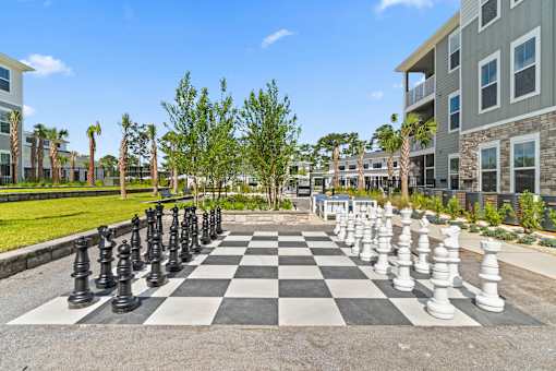 Outdoor Chess Game at The Quinn Luxury Apartments, Florida
