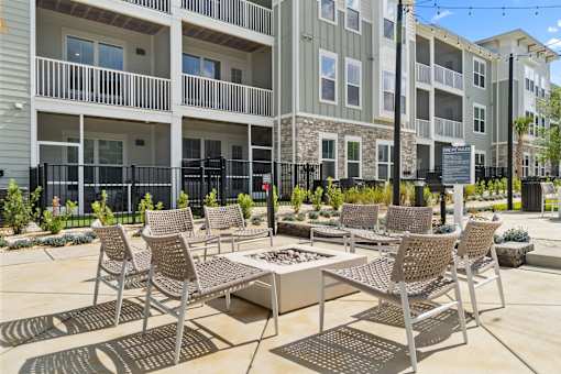 Outdoor Firepit Patio at The Quinn Luxury Apartments, Florida, 32526
