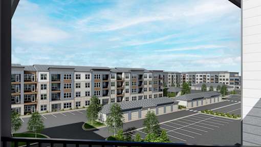 A rendering of a modern apartment complex with a parking lot in front. at Stack at Wheat Ridge Apartments, Wheat Ridge, CO, 80033