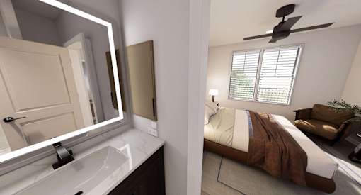 A bedroom with a bed, a mirror, and a ceiling fan at Stack at Wheat Ridge Apartments, Wheat Ridge, Colorado