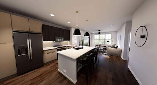A modern kitchen with dark wood floors and white appliances. at Stack at Wheat Ridge Apartments, Colorado, 80033