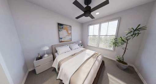 A bedroom with a bed, nightstand, and a ceiling fan at Stack at Wheat Ridge Apartments, Apartments, Wheat Ridge, CO