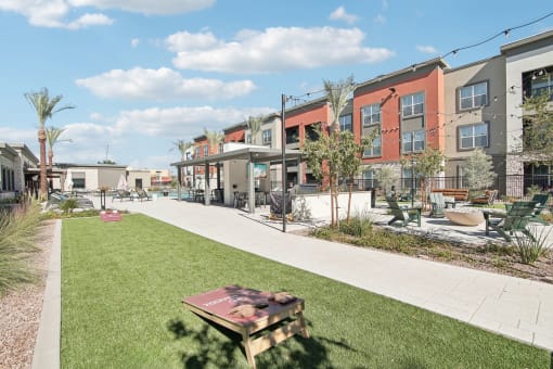 our apartments have a spacious courtyard with a picnic table and lawn at The Maddox Luxury Apartment Homes, Buckeye Arizona  