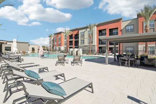 our apartments at the district feature a pool and lounge areas at The Maddox Luxury Apartment Homes, Buckeye, AZ  