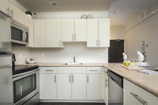 Kitchen and Dining Area at 300 Tache Apartment, Winnipeg, MB.
