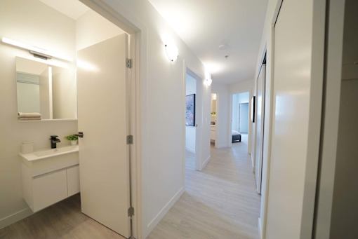Hallway with Closet Storage at 703 St. Anne's Road Apartments, Winnipeg, MB