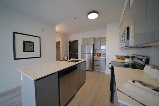 Kitchen With Modern Finishings at 703 St. Anne's Road Apartments, Winnipeg,MB