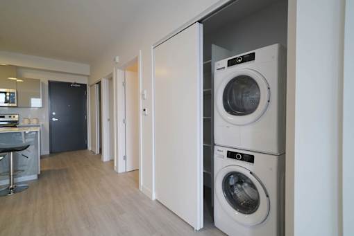 In-suite Washer and Dryer and Closet at 703 St. Anne's Road Apartments, Winnipeg, MB