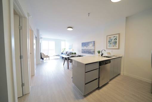 Modern Kitchen With Dining Area at 703 St. Anne's Road Apartments, Winnipeg,MB