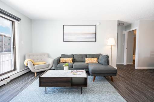 a living room with a couch and a coffee table