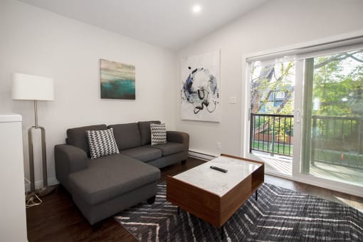 a living room with a couch and a coffee table