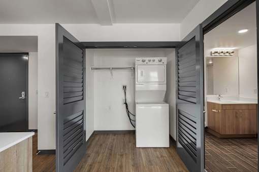 White Center, WA Apartments For Rent - Elevation16 - In-Unit Washer & Dryer Inside Closet