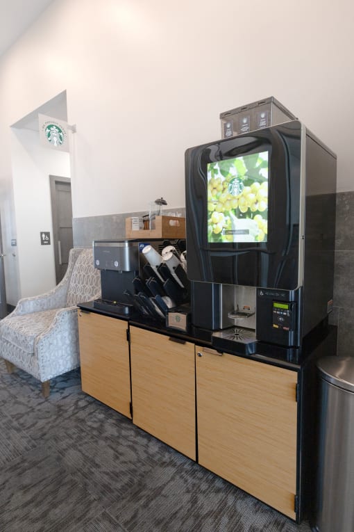 a television and a chair in a hotel room