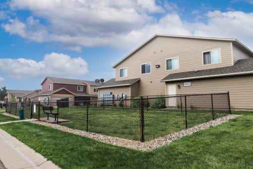 the yards are fenced off with a chain link fence