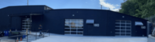 a large blue building with a large window