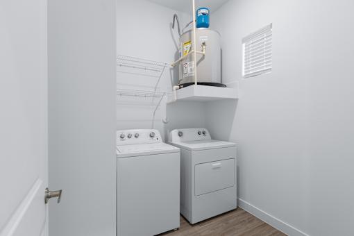 A laundry room with a washer and dryer.